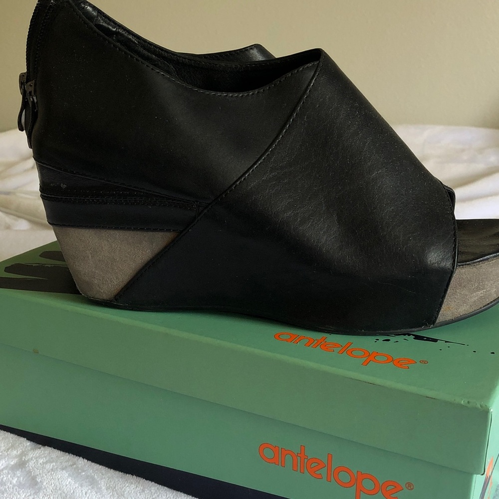 Antelope Black Leather Peep-Toe Wedge Sandal with Gray Accent